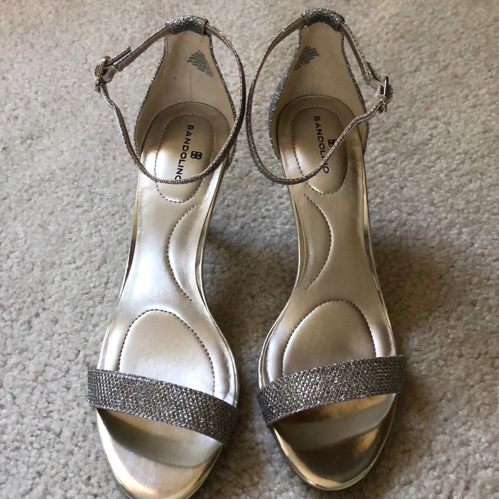 7.5 gold strap heel.